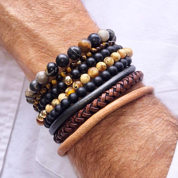 2 men's black onyx beaded bracelets stacked with 2 tiger's eye beaded bracelet