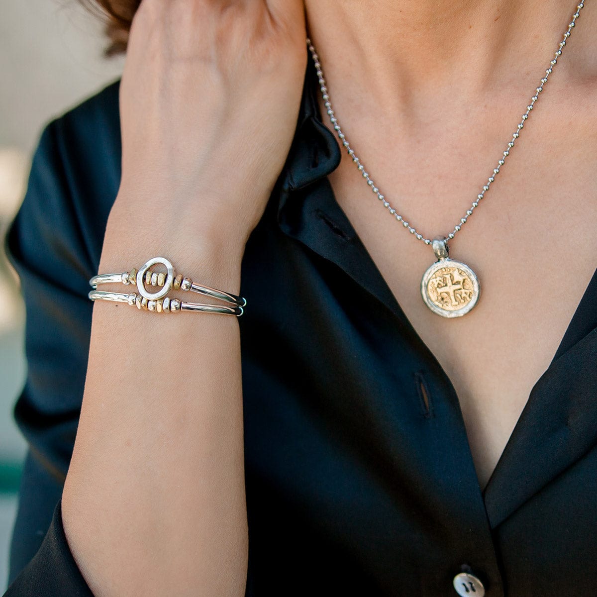 Holiday set featuring gold and silver vintage medallion on adjustable stainless steel necklace