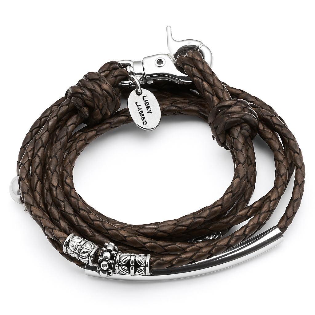 Brown braided leather bracelet with silver accents and a visible brand tag on a white background