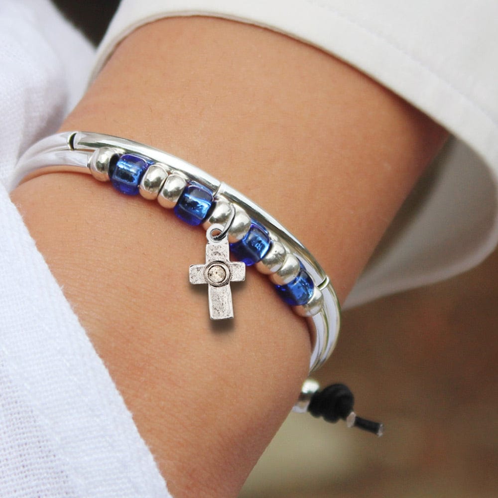 Silver cross with crystal charm