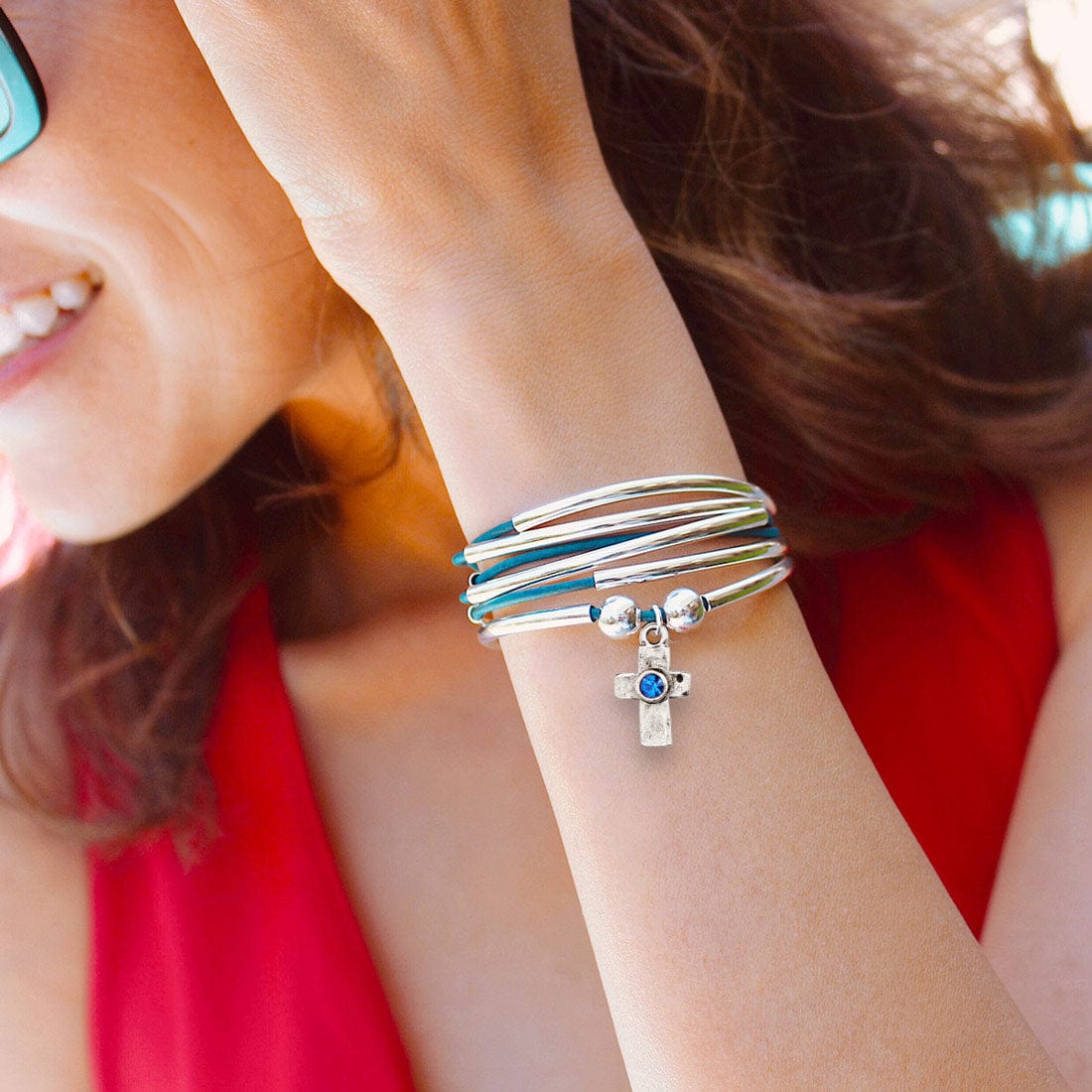 Silver cross blue crystal charm