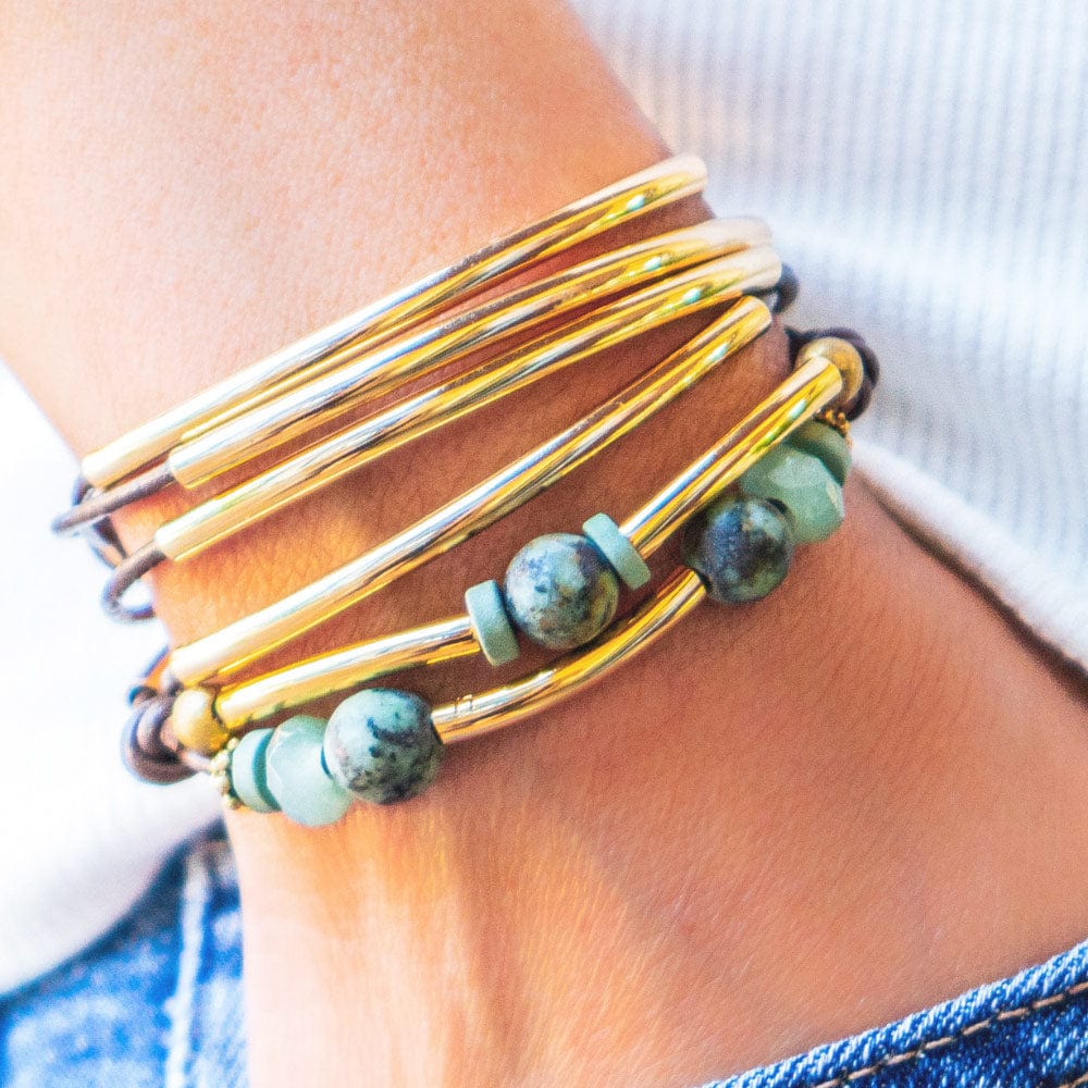 The LJ gemstone jewelry collection featuring turquoise, jade, onyx, lapis lazuli and amethyst bracelets, necklaces and anklets