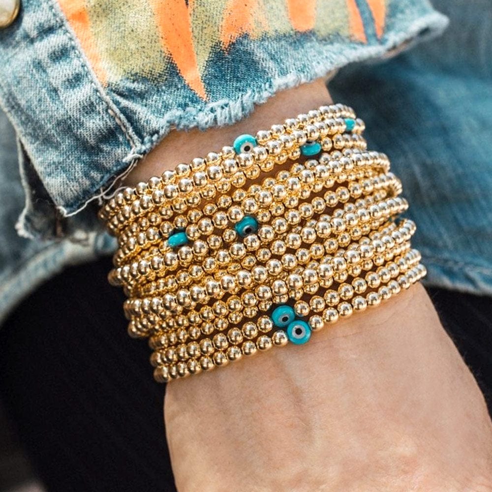 Evil Eye bracelets in 14k gold-filled with mother of pearl evil eye charms