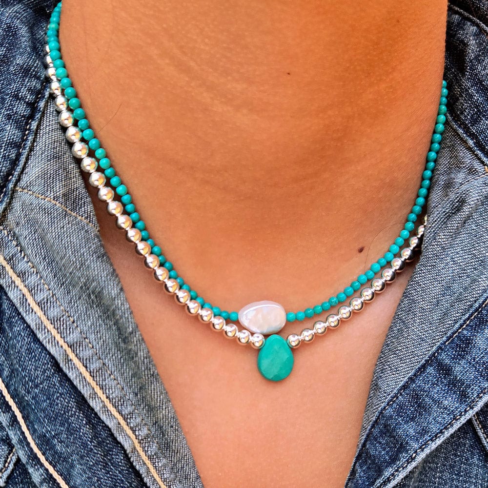 Layered necklaces for women shown in Sterling silver and Turquoise