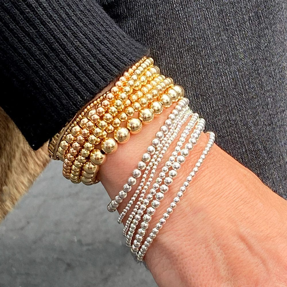 3mm 14k gold filled beaded bracelet stack with 4mm and 6mm 14k gold filled bracelets and sterling silver beaded bracelet stack