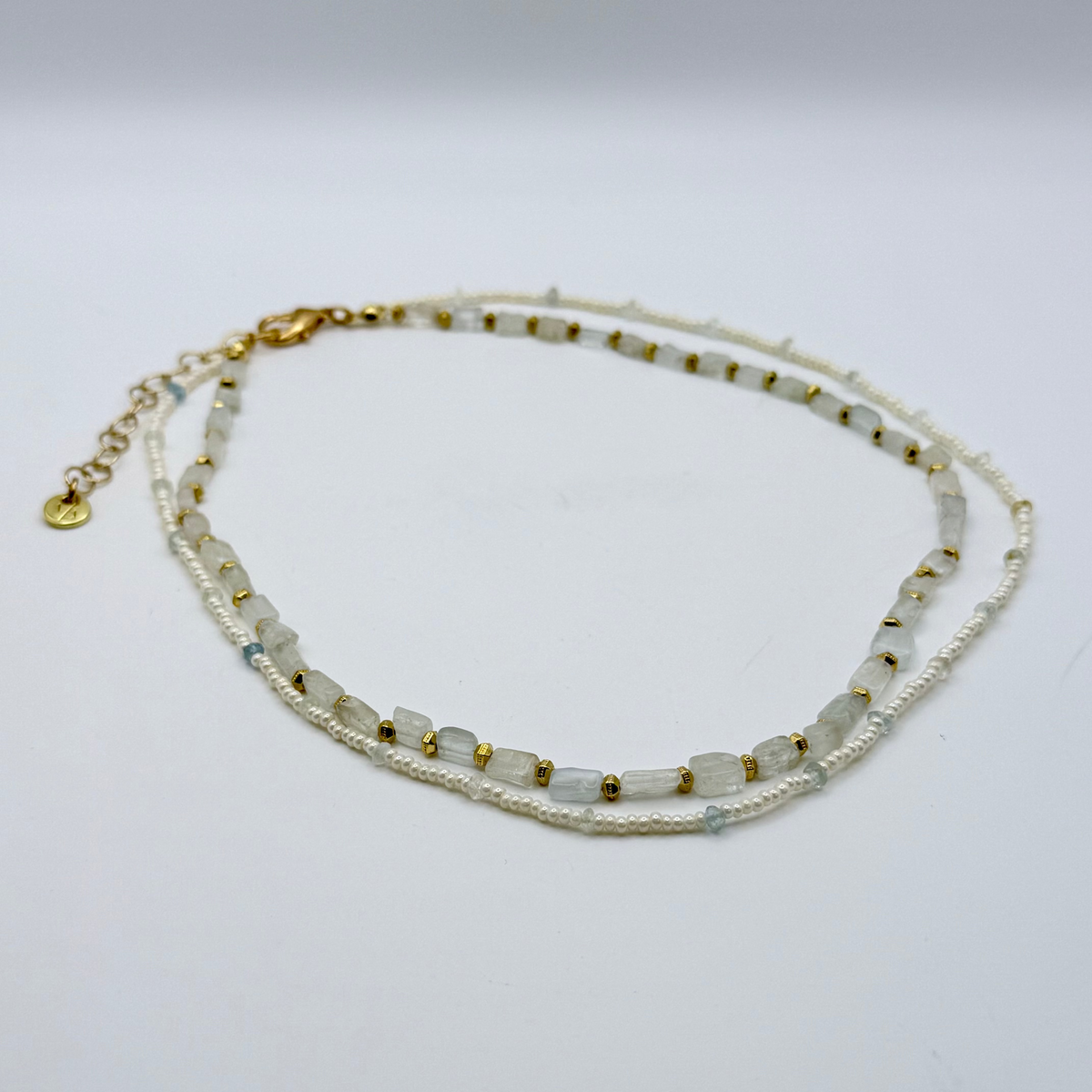 Delicate Aquamarine layered necklace with pearl seed beads and gold hexagon accents