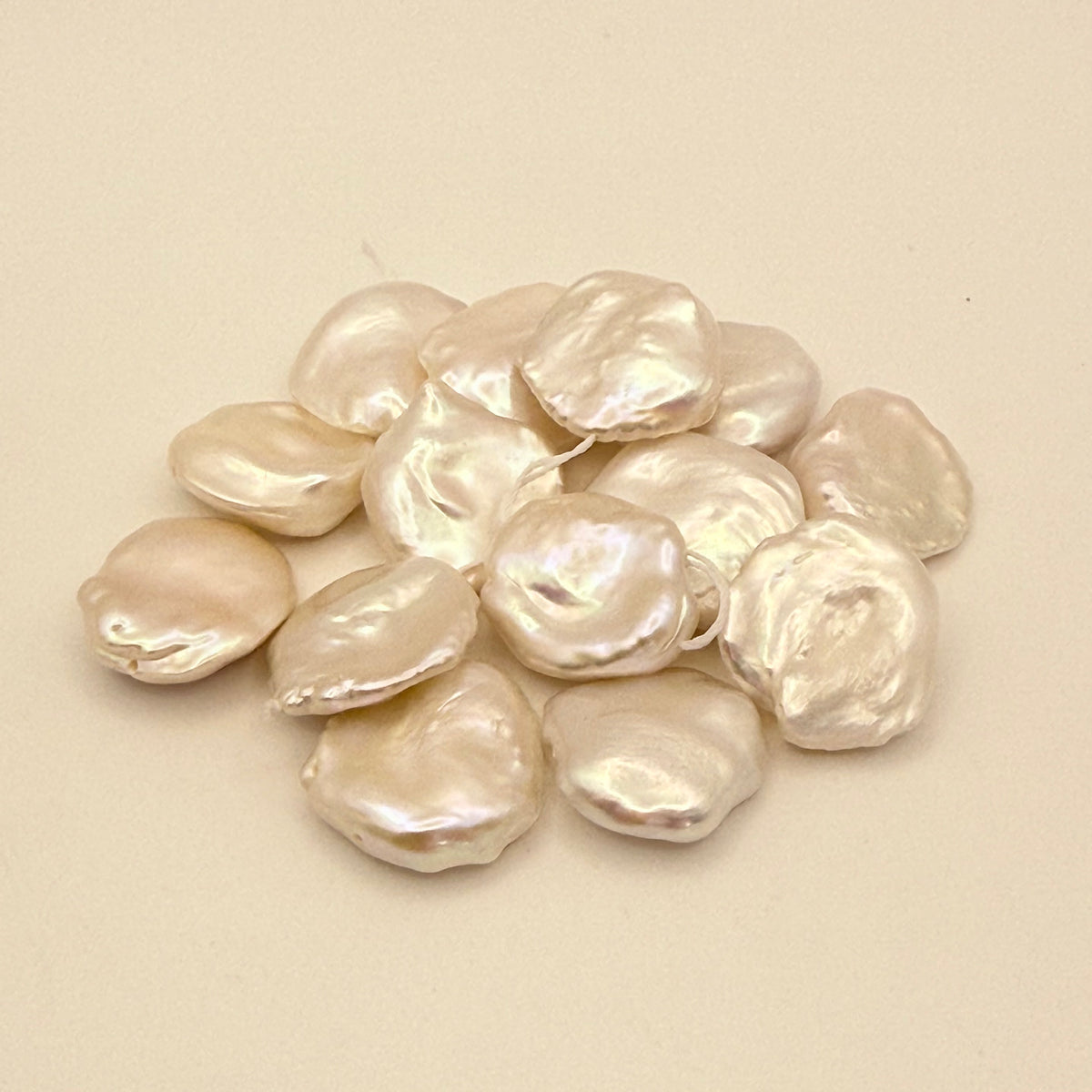 Group of pearls on a beige background