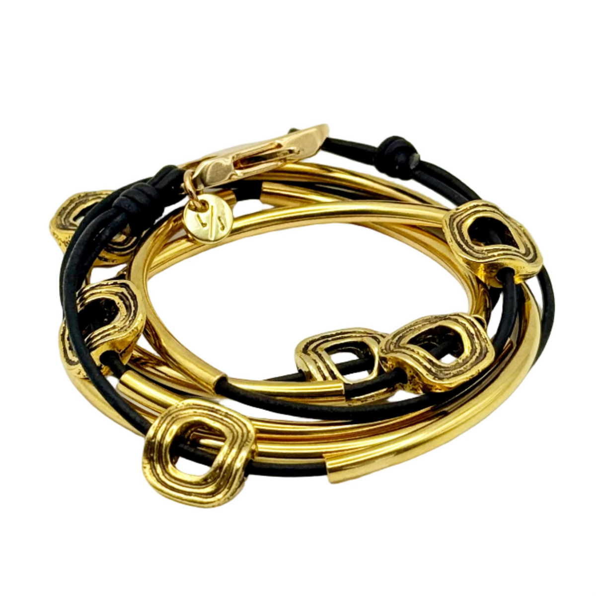Gold and black bracelet set on a white background