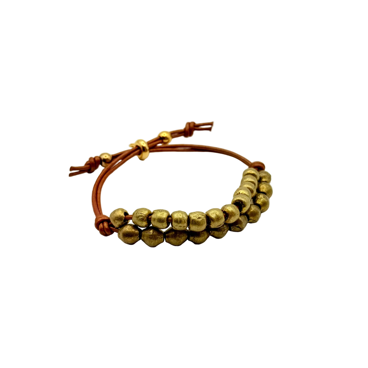 Bracelet with gold beads and brown cord on a white background