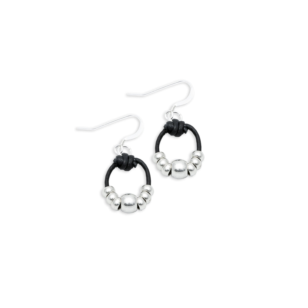 Pair of earrings with black and silver design on a white background