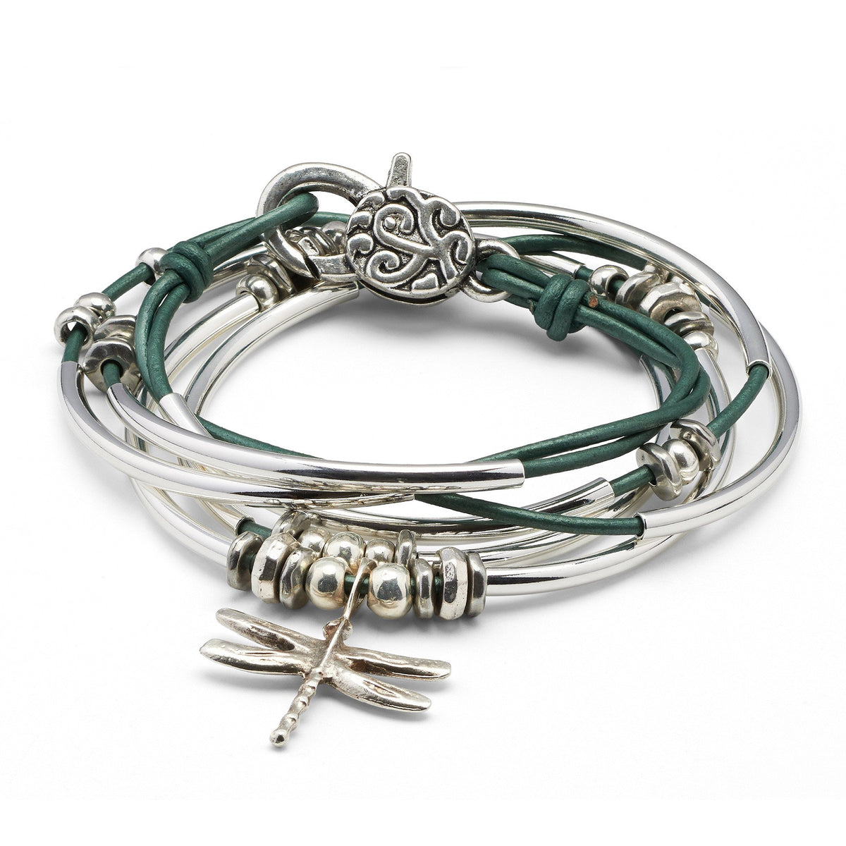 Stack of green and silver bracelets on a white background