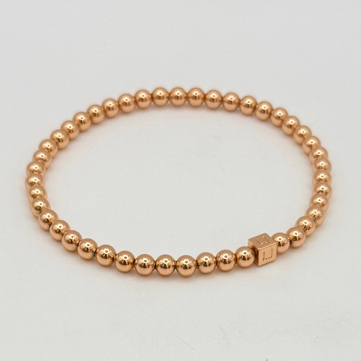 Petal Stacking Bracelet – 4mm Rose Gold-Plated Beads