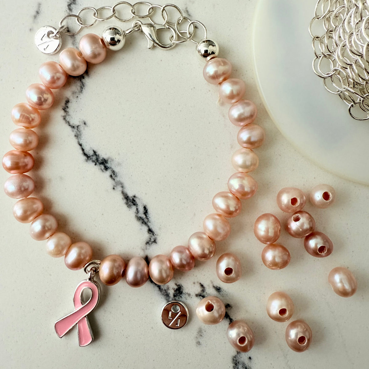 Cherish Adjustable Bracelet with Pink Pearls &amp; Awareness Ribbon Charm