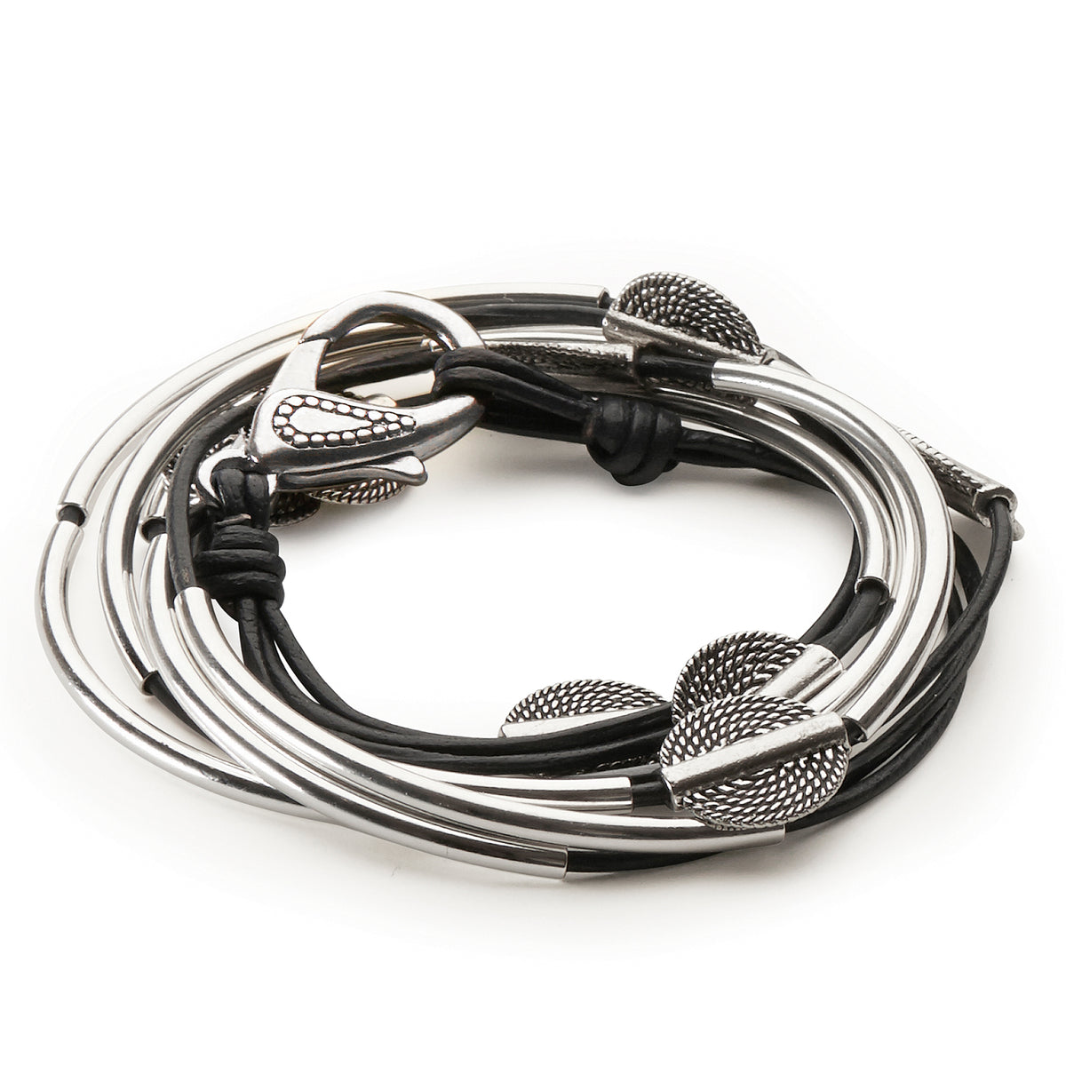 A stack of five leather and metal cuff bracelets, featuring black cords and polished silver-toned metal bands with textured, hammered details, displayed on a clean white background.
