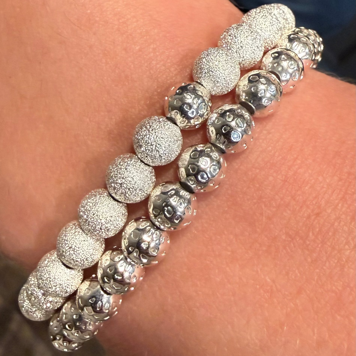 Lizzy James bracelet set on models arm