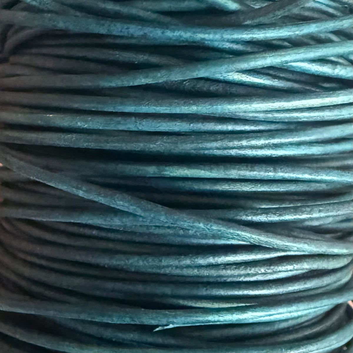Natural Peacock leather spool