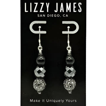 Pair of earrings on a Lizzy James branded card