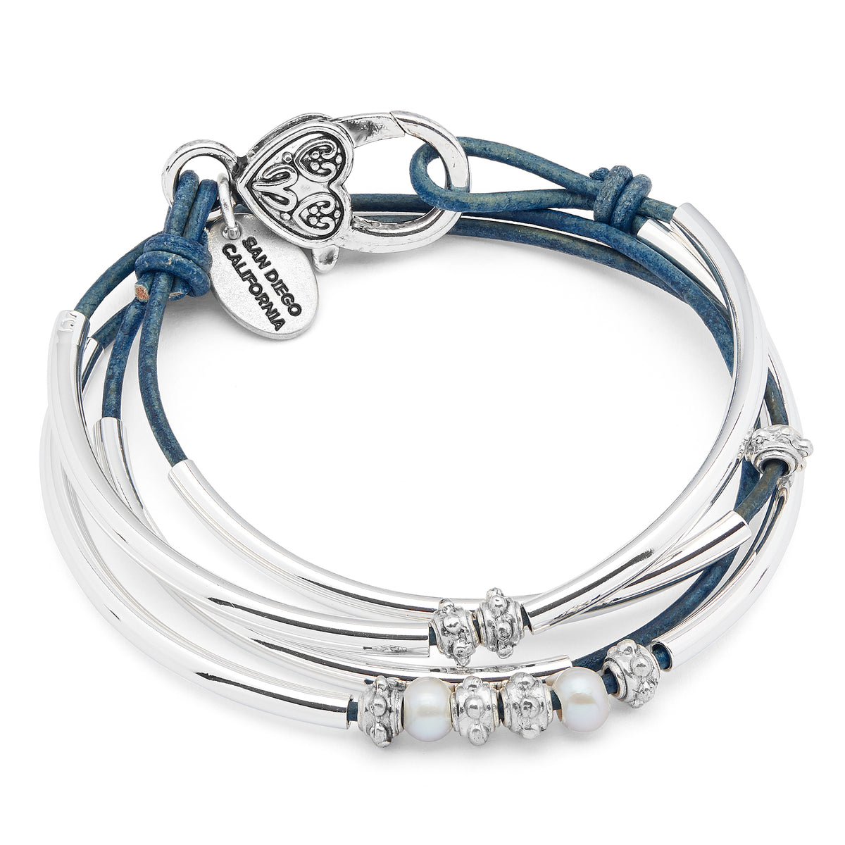 Silver bracelet with blue cord and heart-shaped charm on a white background