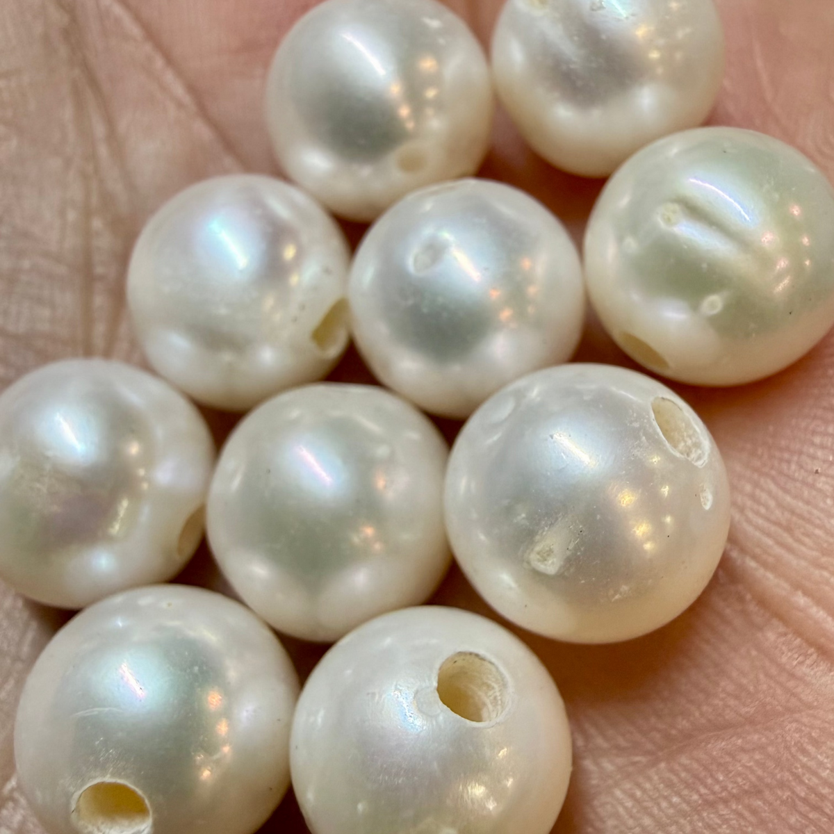 Pearl beads on a hand