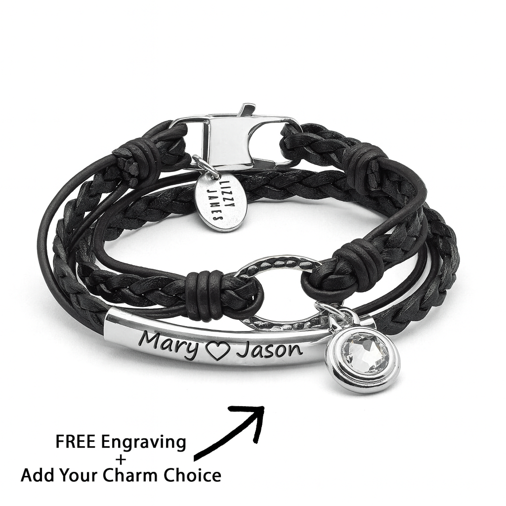 Black braided leather bracelet with silver charms on a white background
