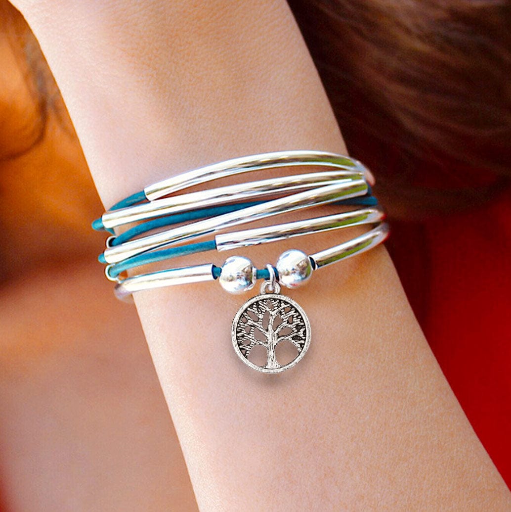 Lizzy James Girlfriend Blue Leather Wrap Bracelet with Silver Crescents shown with the Open Tree of Life charm