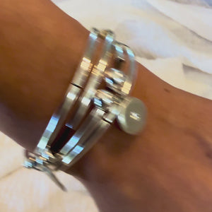Video of charm bracelet on wrist.