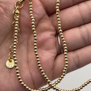 Video of hand holding Sloan herkimer Diamond Necklace with 3mm Goldfilled Beads