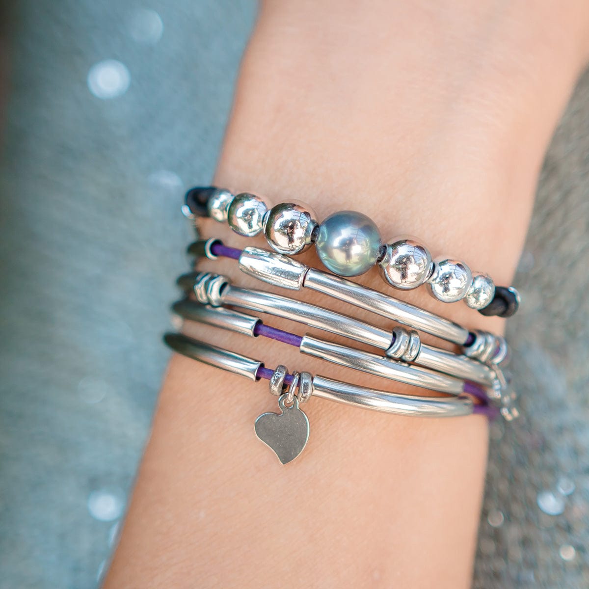 Holiday 2020 Mila Adjustable Bracelet stacked with Mini Madonna charm bracelet