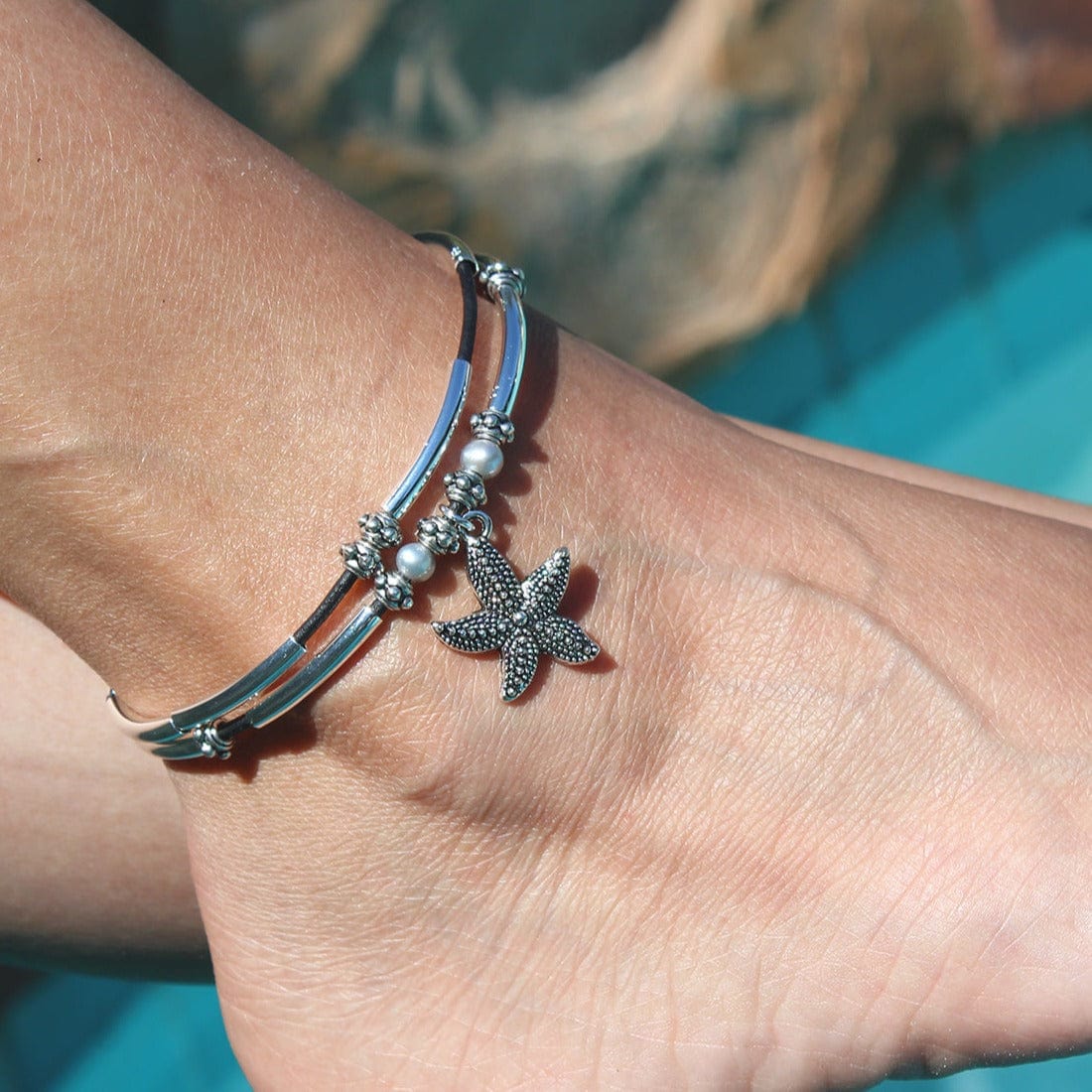 Lucy anklet with natural black cross and starfish charm large 