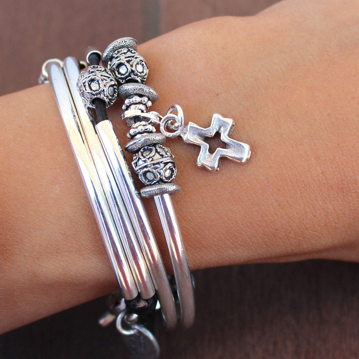 Open Cross Charm on the Mini June 2 Strand wrap bracelet in Natural Black Leather Charms