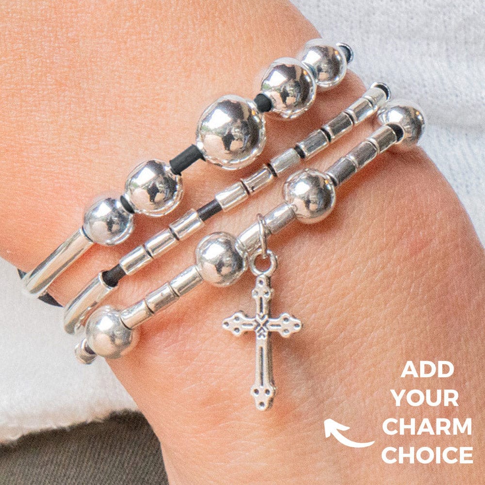 Wisdom and Evolve bracelet with cross charm