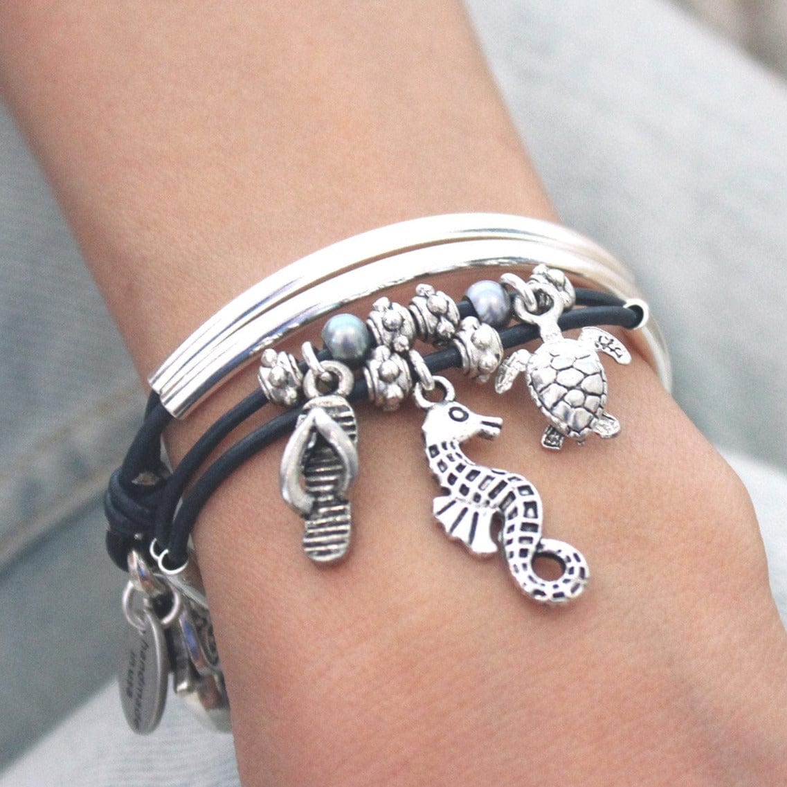 Mini charmer leather wrap bracelet with nautical charm trio (turtle, sandal, seahorse)
